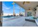 Entertainer's patio featuring a pool with a water feature, seating, barbecue, and a ceiling fan at 278 Iron Duke Ave, Las Vegas, NV 89183