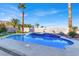 Inviting swimming pool with waterfall features and spacious deck at 278 Iron Duke Ave, Las Vegas, NV 89183