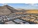 Aerial view of houses and mountain backdrop at 3018 Fall Solstice Ct, Las Vegas, NV 89138