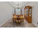 Elegant dining room featuring a chandelier and hardwood floors at 3018 Fall Solstice Ct, Las Vegas, NV 89138