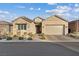 Inviting home exterior featuring a two-car garage and charming facade at 3018 Fall Solstice Ct, Las Vegas, NV 89138