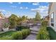 Relaxing outdoor fire pit area with built-in seating at 3018 Fall Solstice Ct, Las Vegas, NV 89138