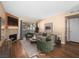 Bright living room boasts a mosaic fireplace, comfortable seating, and a sliding glass door to a private balcony at 3038 Casey Dr # 204, Las Vegas, NV 89120