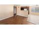 Bright open-concept living space connects the living room, kitchen, and dining area, creating a seamless and airy atmosphere at 3038 Casey Dr # 204, Las Vegas, NV 89120