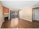 Bright living room boasts a mosaic fireplace, comfortable seating, and a sliding glass door to a private balcony at 3038 Casey Dr # 204, Las Vegas, NV 89120