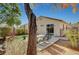 Backyard with patio, grass, and a view of the house at 3060 Lapis Beach Dr, Las Vegas, NV 89117