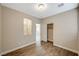 Bright bedroom with hardwood floors, closet, and window at 3060 Lapis Beach Dr, Las Vegas, NV 89117