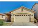 One-story house with attached garage and neutral color scheme at 3060 Lapis Beach Dr, Las Vegas, NV 89117