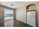 Kitchen with sliding glass door leading to backyard patio at 3060 Lapis Beach Dr, Las Vegas, NV 89117