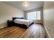 Main bedroom with wood-look floors and plenty of natural light at 3083 Casey Dr # 101, Las Vegas, NV 89120