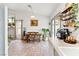 Cozy kitchen dining area with tile floors and access to the backyard at 3119 Crownline Ct, North Las Vegas, NV 89031