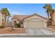 Single-story home with attached garage at 3119 Crownline Ct, North Las Vegas, NV 89031