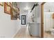 Clean hallway with light gray cabinets and a view of the bathroom at 3119 Crownline Ct, North Las Vegas, NV 89031