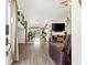 Bright living room with hardwood floors, and a view into the dining area at 3119 Crownline Ct, North Las Vegas, NV 89031