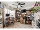 Bright home office with built-in shelving and hardwood floors at 3119 Crownline Ct, North Las Vegas, NV 89031