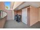 Attached carport area with access door and storage, ideal for keeping vehicles and belongings safe at 3280 James A Bilbray Pkwy, Laughlin, NV 89029