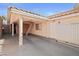 Covered carport with a terracotta-tiled roof, offering shade and protection for vehicles and storage at 3280 James A Bilbray Pkwy, Laughlin, NV 89029