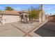 Front yard with a patterned driveway, desert landscaping, and a view of the house at 3280 James A Bilbray Pkwy, Laughlin, NV 89029