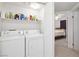 A white laundry room is equipped with washer and dryer units at 3280 James A Bilbray Pkwy, Laughlin, NV 89029