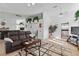 Spacious living room featuring tile floors, fireplace, large sectional sofa, and seamless flow into other rooms at 3280 James A Bilbray Pkwy, Laughlin, NV 89029