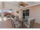 Covered patio features a ceiling fan and outdoor seating arrangement at 3280 James A Bilbray Pkwy, Laughlin, NV 89029