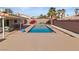 Backyard swimming pool with plenty of patio seating and views, surrounded by mature trees at 3280 James A Bilbray Pkwy, Laughlin, NV 89029