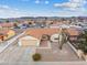 Single-story house with a desert landscape, and a two-car garage at 350 Preston Dr, Henderson, NV 89015