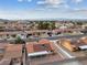 Aerial view showcasing the house, neighborhood, and distant mountain views at 350 Preston Dr, Henderson, NV 89015