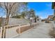 Backyard with concrete patio, storage shed, and block wall at 3708 Penny Cross Dr, North Las Vegas, NV 89032