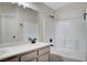 Clean bathroom, featuring a double vanity and a shower/tub combo at 3708 Penny Cross Dr, North Las Vegas, NV 89032