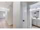 Clean bathroom with gray vanity and view of hallway at 3708 Penny Cross Dr, North Las Vegas, NV 89032