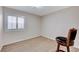 Small bedroom with wood-look floors and a window with shutters at 3708 Penny Cross Dr, North Las Vegas, NV 89032