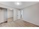 Well-lit bedroom, featuring mirrored closet and wood-look floors at 3708 Penny Cross Dr, North Las Vegas, NV 89032