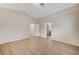 Bright and airy bedroom with wood-look flooring at 3708 Penny Cross Dr, North Las Vegas, NV 89032