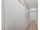 Bright hallway with neutral walls and wood-look floors at 3708 Penny Cross Dr, North Las Vegas, NV 89032