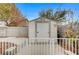 White storage shed in the backyard at 3708 Penny Cross Dr, North Las Vegas, NV 89032