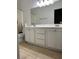 Bright bathroom with double vanity and tile floors at 3717 Seneca Highland St, North Las Vegas, NV 89032