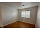 Bright bedroom with wood floors and window at 3717 Seneca Highland St, North Las Vegas, NV 89032