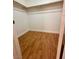 Walk-in closet with wood floors and shelving at 3717 Seneca Highland St, North Las Vegas, NV 89032