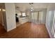 Dining area with hardwood floors and sliding doors at 3717 Seneca Highland St, North Las Vegas, NV 89032