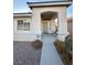 Front porch with a bench, leading to the entrance at 3717 Seneca Highland St, North Las Vegas, NV 89032