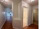 Bright hallway with bathroom access at 3717 Seneca Highland St, North Las Vegas, NV 89032