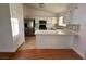 Modern kitchen with island and view at 3717 Seneca Highland St, North Las Vegas, NV 89032