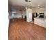 Spacious living area with hardwood floors and a fireplace at 3717 Seneca Highland St, North Las Vegas, NV 89032