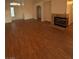 Open living space with hardwood floors and fireplace at 3717 Seneca Highland St, North Las Vegas, NV 89032