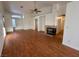 Living room featuring hardwood floors and a fireplace at 3717 Seneca Highland St, North Las Vegas, NV 89032