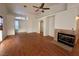 Living room with hardwood floors and a fireplace at 3717 Seneca Highland St, North Las Vegas, NV 89032