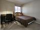 Comfortable bedroom with a desk and chair; ample natural light at 3800 Desert Marina Dr # 160, Laughlin, NV 89029