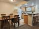 Eat-in kitchen with granite countertops and modern appliances at 3800 Desert Marina Dr # 160, Laughlin, NV 89029