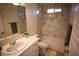 Clean bathroom, featuring a bathtub and marble-style shower at 3880 Leonard St, Pahrump, NV 89060